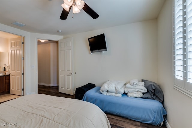 bedroom featuring wood-type flooring and ceiling fan