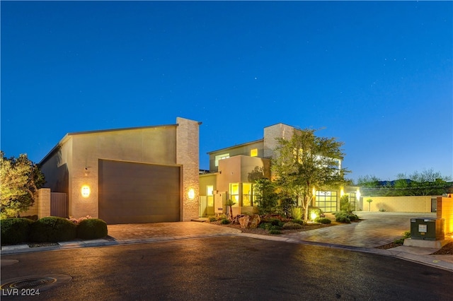 view of front of home with a garage