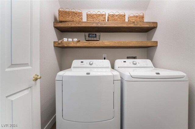 laundry room featuring washer and clothes dryer