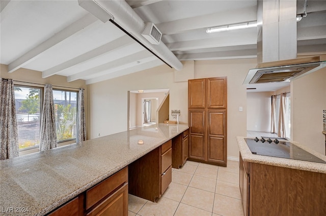 kitchen featuring black electric stovetop, vaulted ceiling with beams, light stone counters, and light tile patterned floors