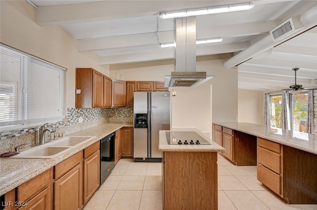 kitchen with black appliances, sink, ceiling fan, tasteful backsplash, and a kitchen island