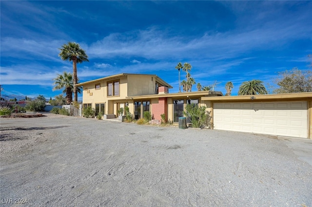 view of front of property featuring a garage