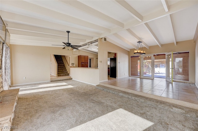 unfurnished living room with light tile patterned floors, lofted ceiling with beams, and ceiling fan with notable chandelier