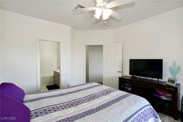 bedroom with ensuite bath and ceiling fan