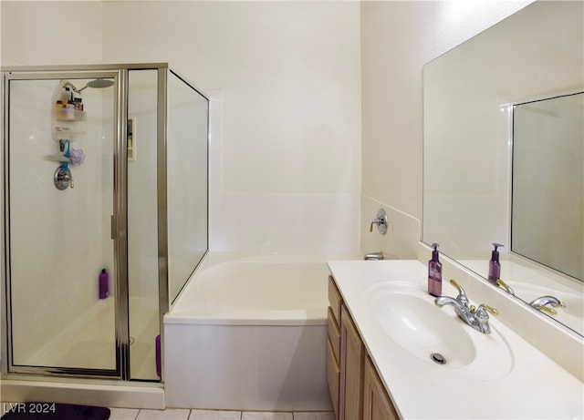 bathroom with tile patterned flooring, vanity, and independent shower and bath