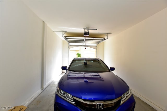 garage featuring a garage door opener