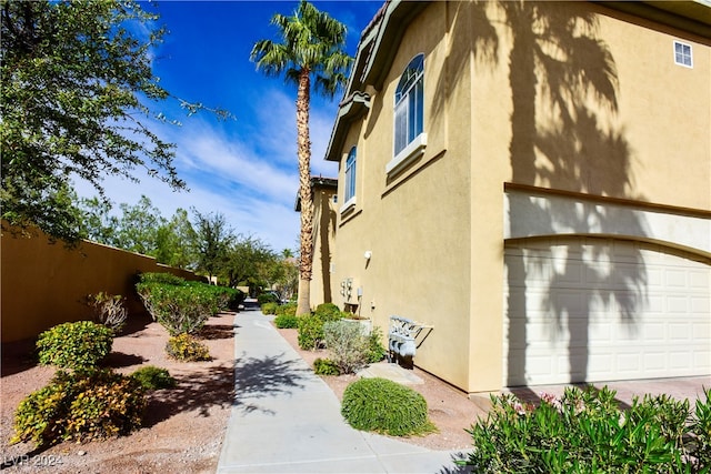 view of home's exterior with a garage