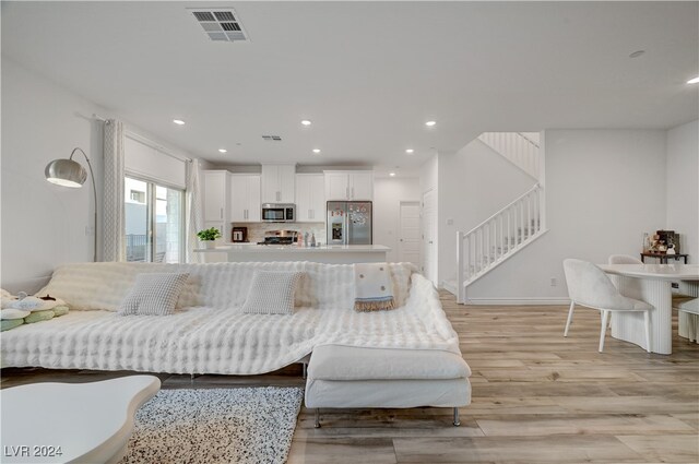 living room with light wood-type flooring