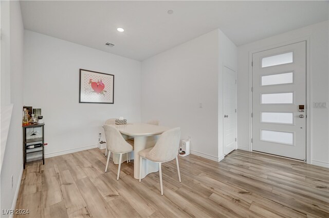 dining room featuring light hardwood / wood-style flooring