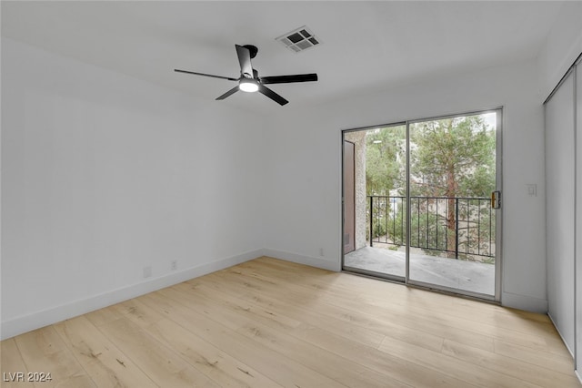 unfurnished room featuring ceiling fan and light hardwood / wood-style flooring