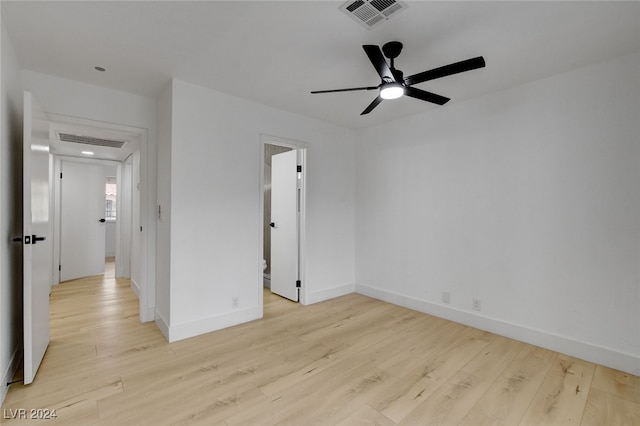 unfurnished room with ceiling fan and light hardwood / wood-style flooring