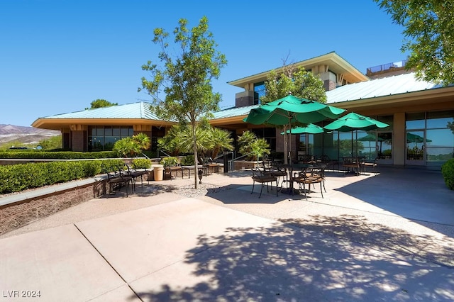 view of community featuring a patio area