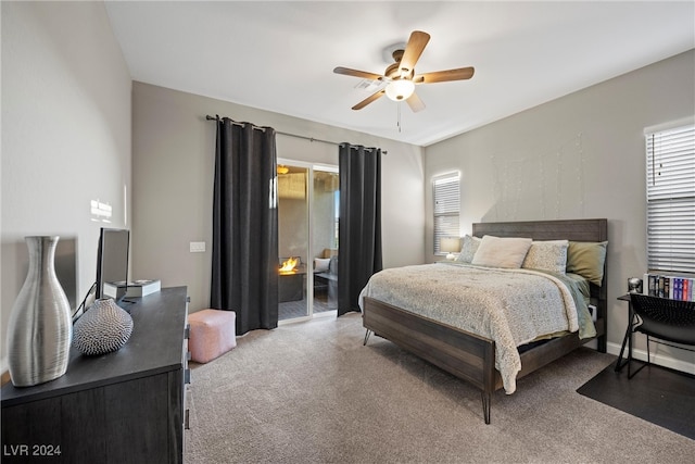 bedroom with access to outside, carpet floors, and ceiling fan