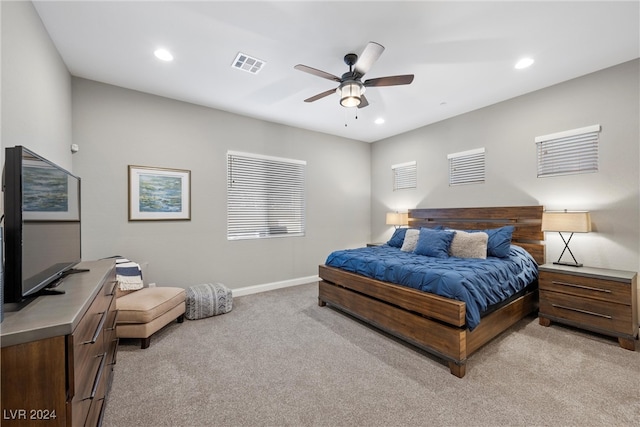 carpeted bedroom with ceiling fan