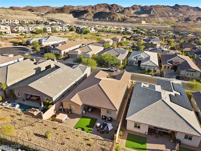 bird's eye view with a mountain view