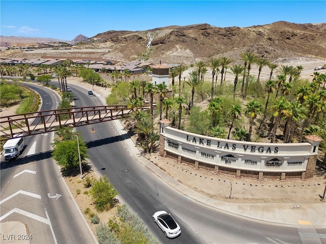 birds eye view of property with a mountain view