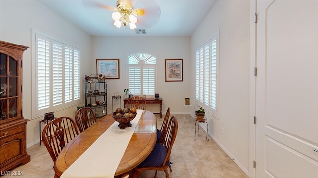 dining room with ceiling fan