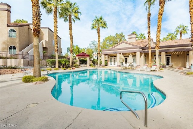 view of pool with a patio area