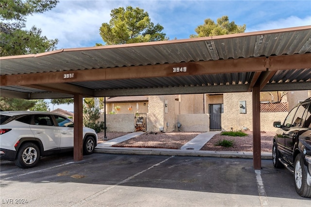 view of parking featuring a carport