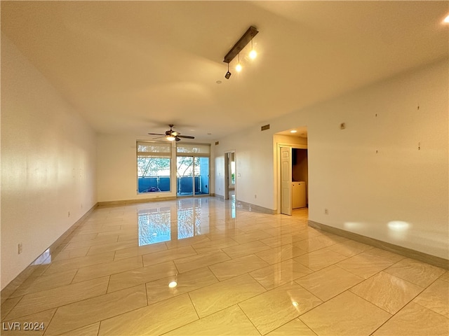 spare room featuring ceiling fan