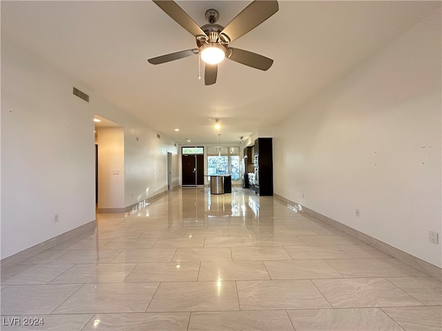 spare room featuring ceiling fan