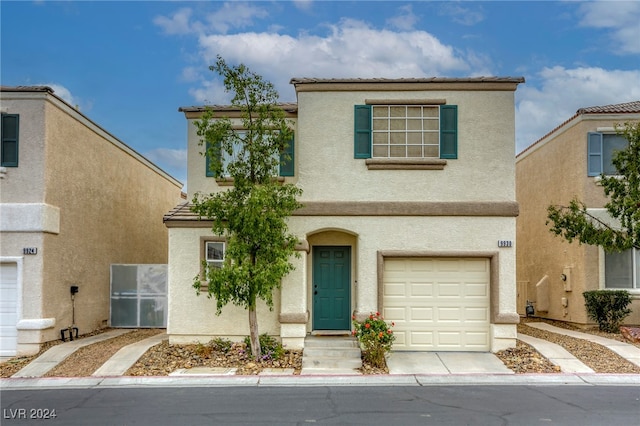 view of front of property featuring a garage