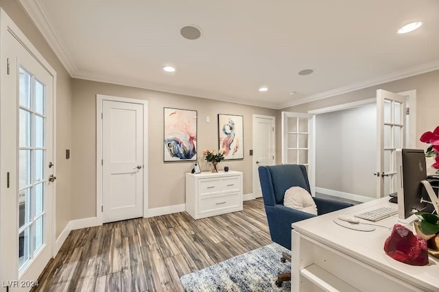 office area with french doors, hardwood / wood-style flooring, and crown molding