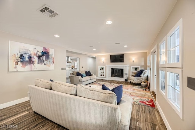 living room featuring dark hardwood / wood-style flooring