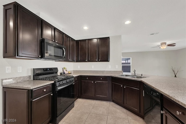 kitchen with black appliances, dark brown cabinetry, light tile patterned floors, sink, and kitchen peninsula