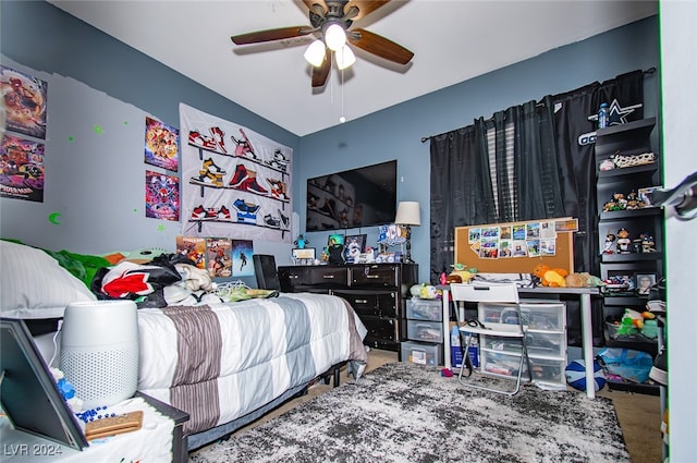 bedroom with ceiling fan and carpet floors