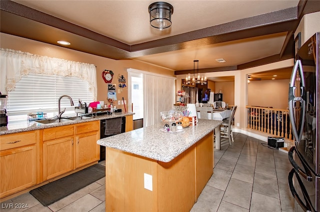 kitchen with light tile patterned flooring, sink, black appliances, and a kitchen island