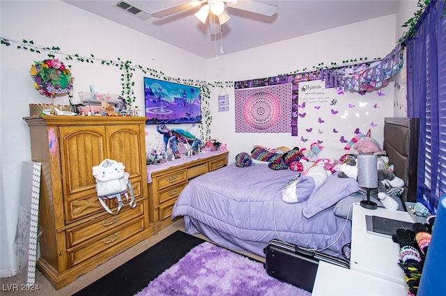 carpeted bedroom with ceiling fan