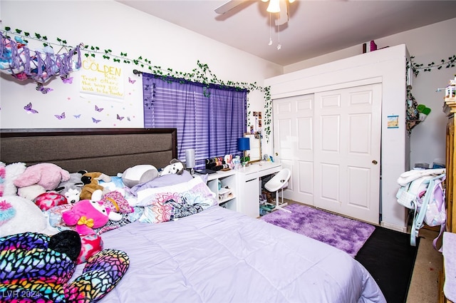 bedroom featuring ceiling fan, a closet, and carpet floors