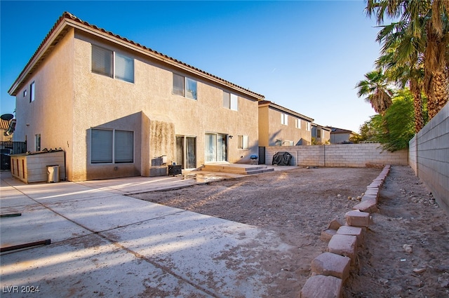 rear view of house with a patio area