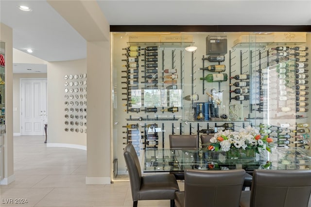 wine room with light tile patterned flooring