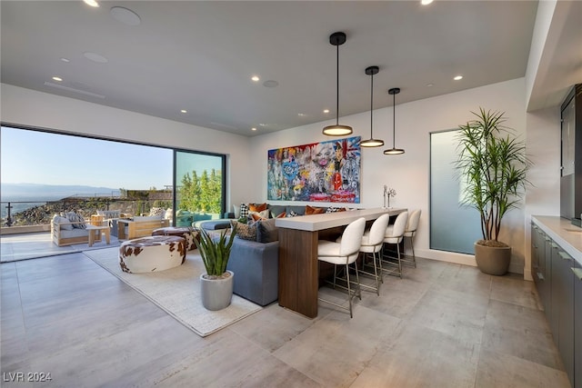 interior space with hanging light fixtures and a mountain view