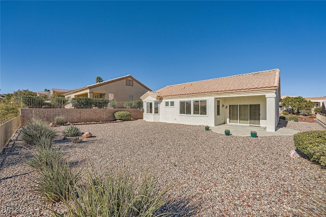 rear view of property with a patio