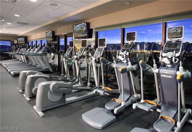 workout area featuring a drop ceiling