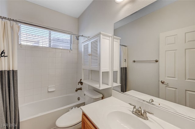 full bathroom featuring vanity, shower / bath combination with curtain, and toilet