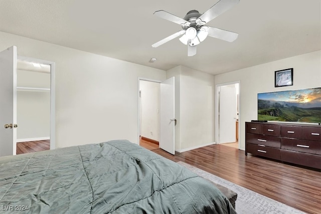 bedroom featuring ceiling fan and light hardwood / wood-style flooring