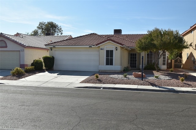 view of front of home with a garage