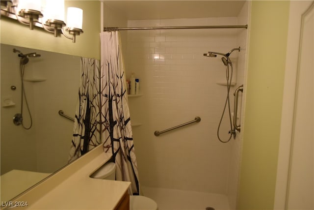 bathroom featuring vanity and walk in shower