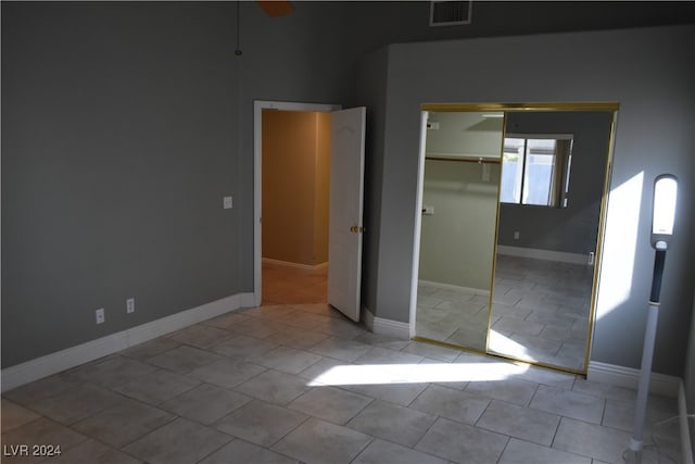 unfurnished bedroom featuring a closet