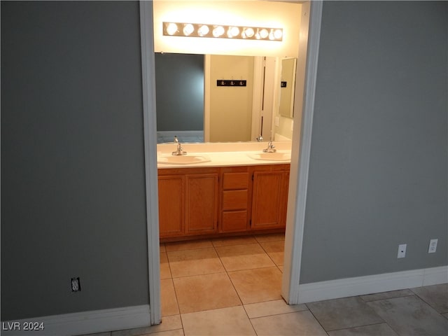 bathroom featuring tile patterned floors and vanity