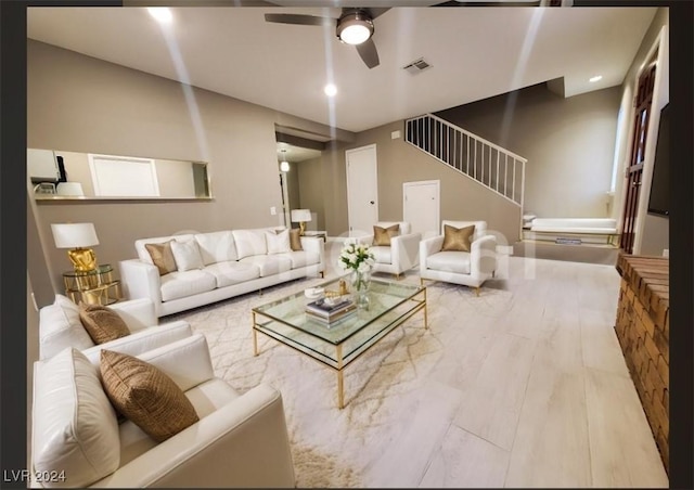 living room featuring ceiling fan