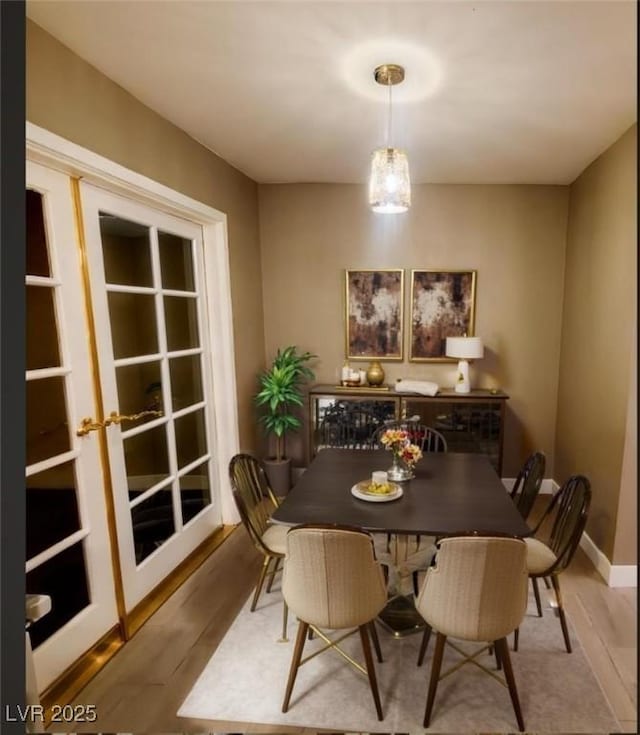 dining area featuring hardwood / wood-style floors