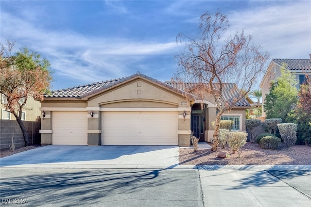 view of front of property featuring a garage