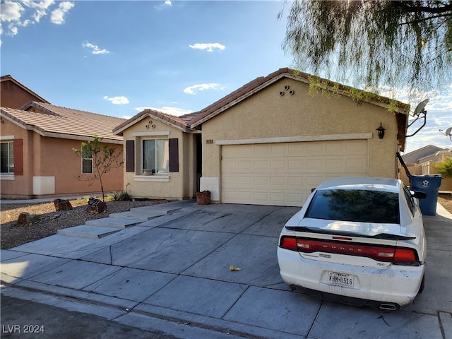 view of front of home with a garage