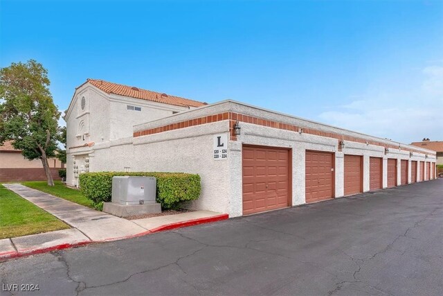 exterior space with a garage