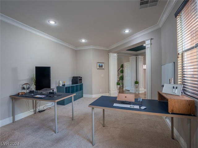 office featuring light carpet, a wealth of natural light, and decorative columns